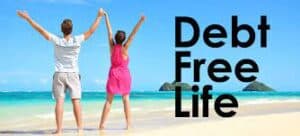 picture of people on beach celebrating debt free life 